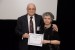 Dr. Nagib Callaos, General Chair, giving Dr. Esther Zaretsky the outstanding paper award for the paper entitled: "Improving Real Time Motor Skills in Physical Education by Virtual Computerized Technology Training. A Successful Attempt at Teaching Novice Computer Users."